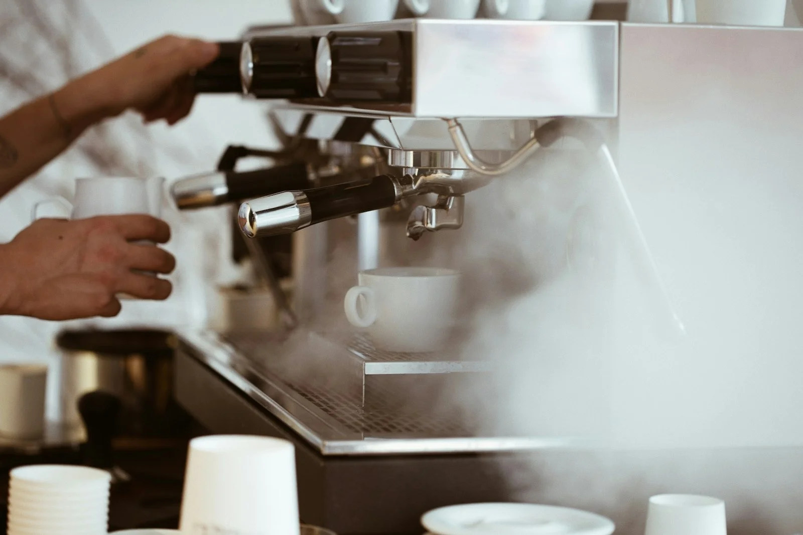 Preparing coffee at an espresso machine